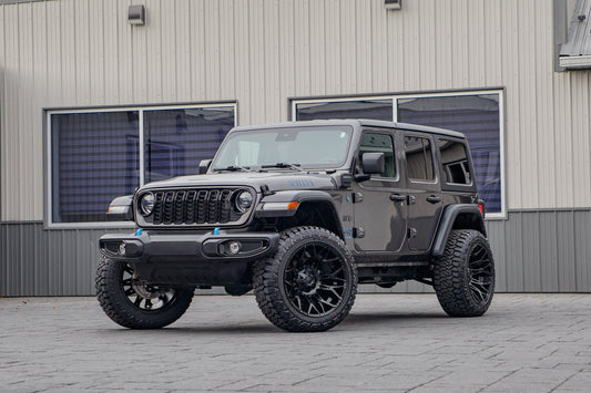 2024 Jeep Wrangler Sport S 4XE with a 2.5" Rough Country lift kit, 22x12 Fuel Twitch wheels, and 35" Fury Country Hunter R/T tires.