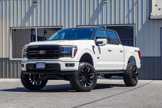 2026 Ford F-150 Lariat with a 6" Rough Country lift kit, 22x12 Fuel Rebar wheels, and 35" Fury Country Hunter R/T tires.