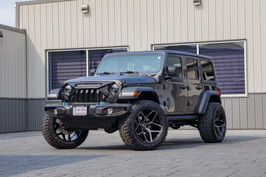 2023 Jeep Wrangler Sahara 4XE with a 2.5" Rough Country lift kit, 22x12 Fuel Flux wheels, and 35" Avix Trailtek R/T tires.