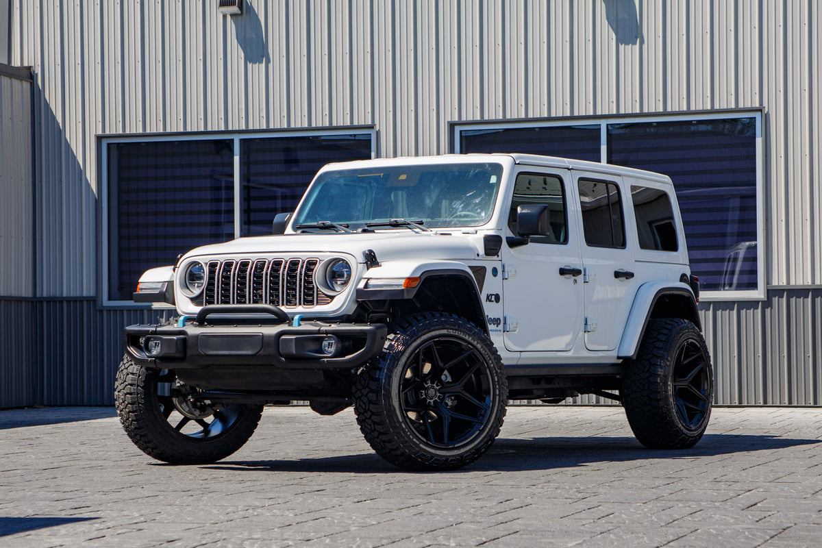 2025 Jeep Wrangler Sahara 4XE with a 2.5" Rough Country lift kit, 22x12 Fuel Flux wheels, and 35" Fury Country Hunter R/T tires.