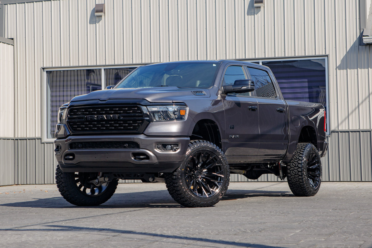 2024 Ram 1500 Lone Star with a 6" Rough Country lift kit, 22x12 Fuel Flame wheels, and 35" Fury Country Hunter R/T tires.