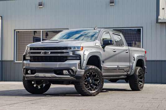 2022 Chevrolet Silverado 1500 RST with a 6" American Luxury Coach Lift kit, 22x12 Fuel Assault wheels, and 35" Mickey Thompson Baja Boss A/T tires.