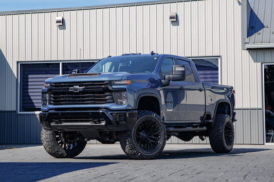 2026 Chevrolet Silverado 2500 Custom with a 6" BDS lift kit, 22x12 Fuel Strike wheels, and 37" Nitto Ridge Grappler tires.