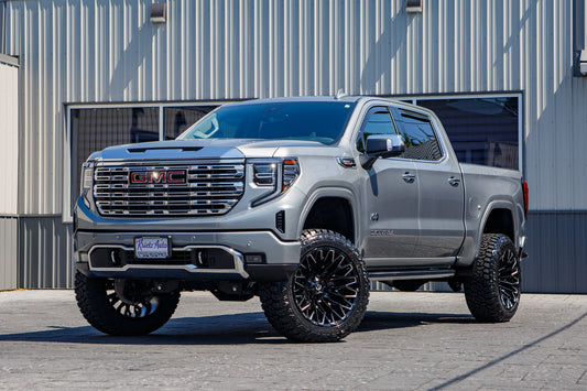 2024 GMC Sierra 1500 Denali with a 6" Rough Country lift kit, 22x12 Fuel Strike wheels, and 35" Fury Country Hunter R/T tires.