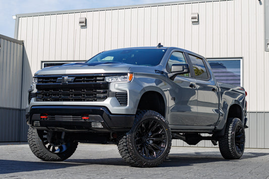 2025 Chevrolet Silverado 1500 LT Trail Boss with a 6" Rough Country lift kit, 22x12 Fuel Flame wheels, and 35" Fury Country Hunter R/T tires.