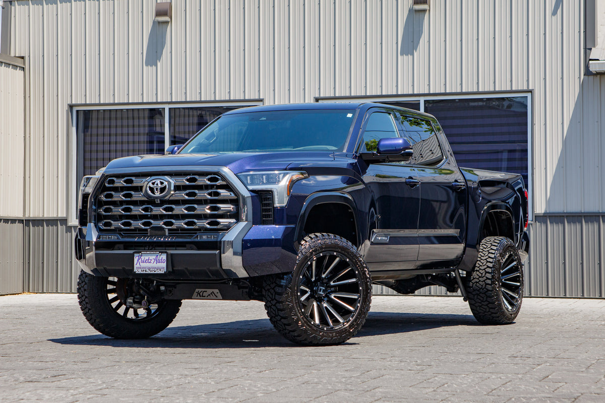 2025 Toyota Tundra 1794 Edition with a 6" Rough Country lift kit, 22x12 Hostile H123 wheels, and 35" Fury Country Hunter R/T tires.