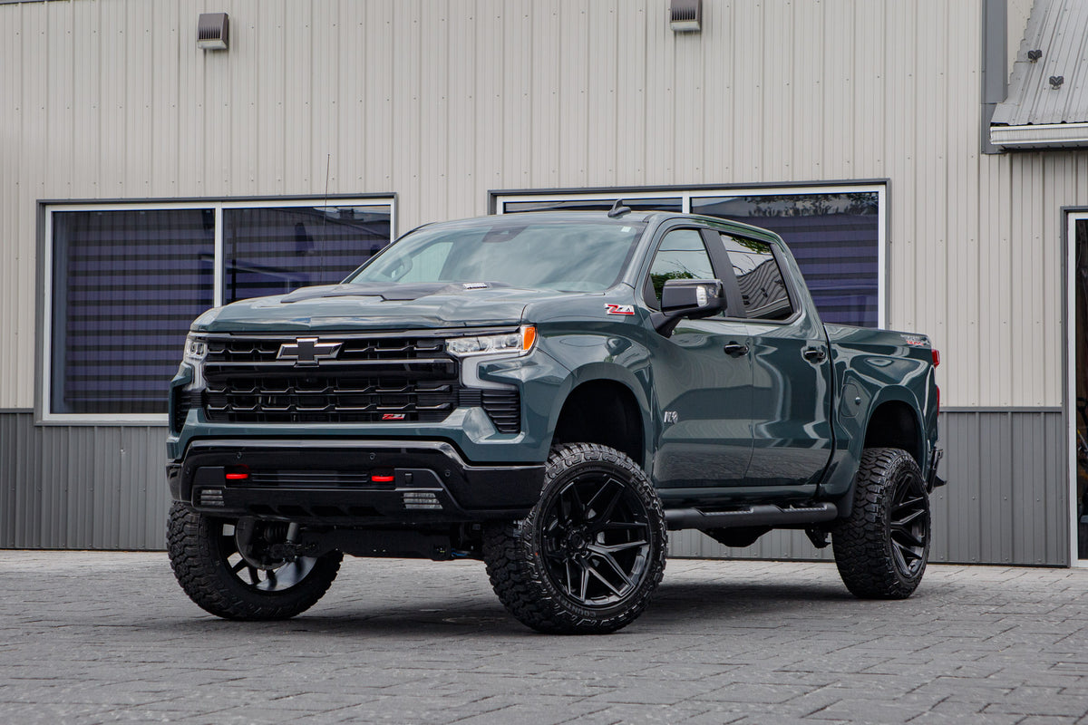 2026 Chevrolet Silverado 1500 LT Trail Boss with a 6" Rough Country lift kit, 22x12 Fuel Flux wheels, and 35" Fury Country Hunter R/T tires.