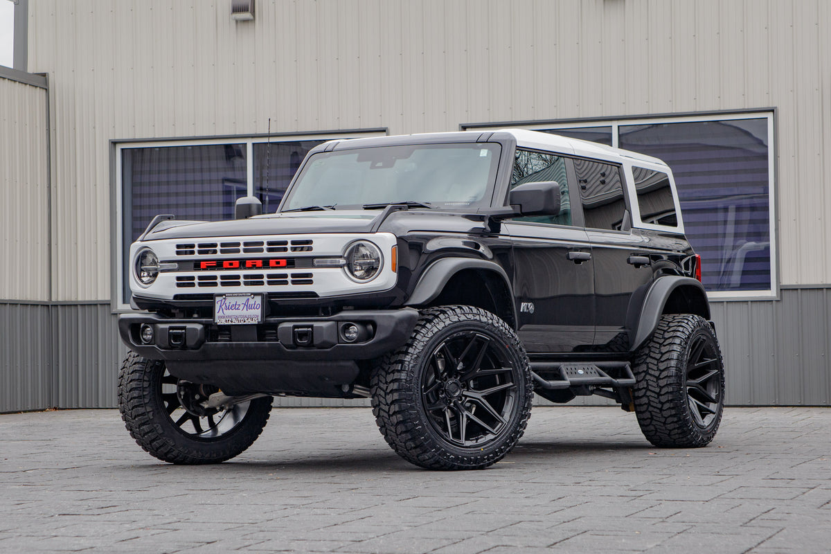 2025 Ford Bronco Heritage Edition with a 2.5" Rough Country lift kit, 22x12 Fuel Flux wheels, and 35" Avix Trailtek R/T tires.