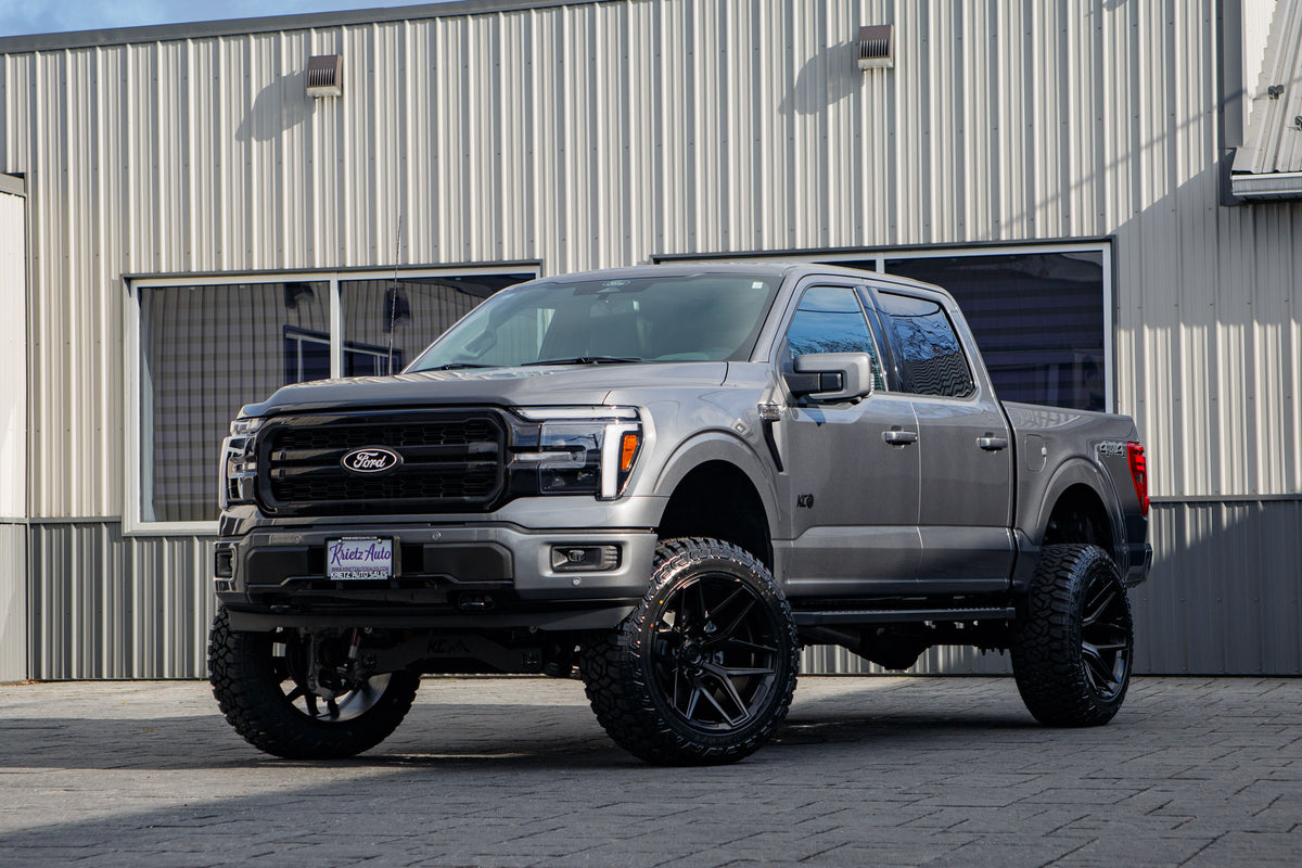 2025 Ford F-150 Lariat with a 6" Rough Country lift kit, 22x12 Fuel Flux wheels, and 35" Fury Country Hunter R/T tires.