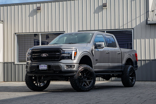 2025 Ford F-150 Lariat with a 6" Rough Country lift kit, 22x12 Fuel Flux wheels, and 35" Fury Country Hunter R/T tires.