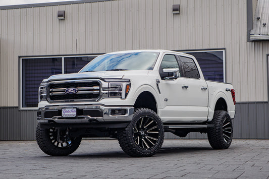 2025 Ford F-150 Lariat with a 6" Rough Country lift kit, 22x12 Hostile H123 wheels, and 35" Fury Country Hunter R/T tires.