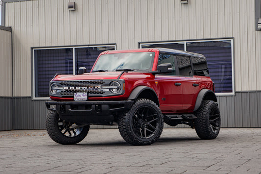 2025 Ford Bronco Badlands with a 2.5" Rough Country lift kit, 22x12 Fuel Flux wheels, and 35" Fury Country Hunter R/T tires.