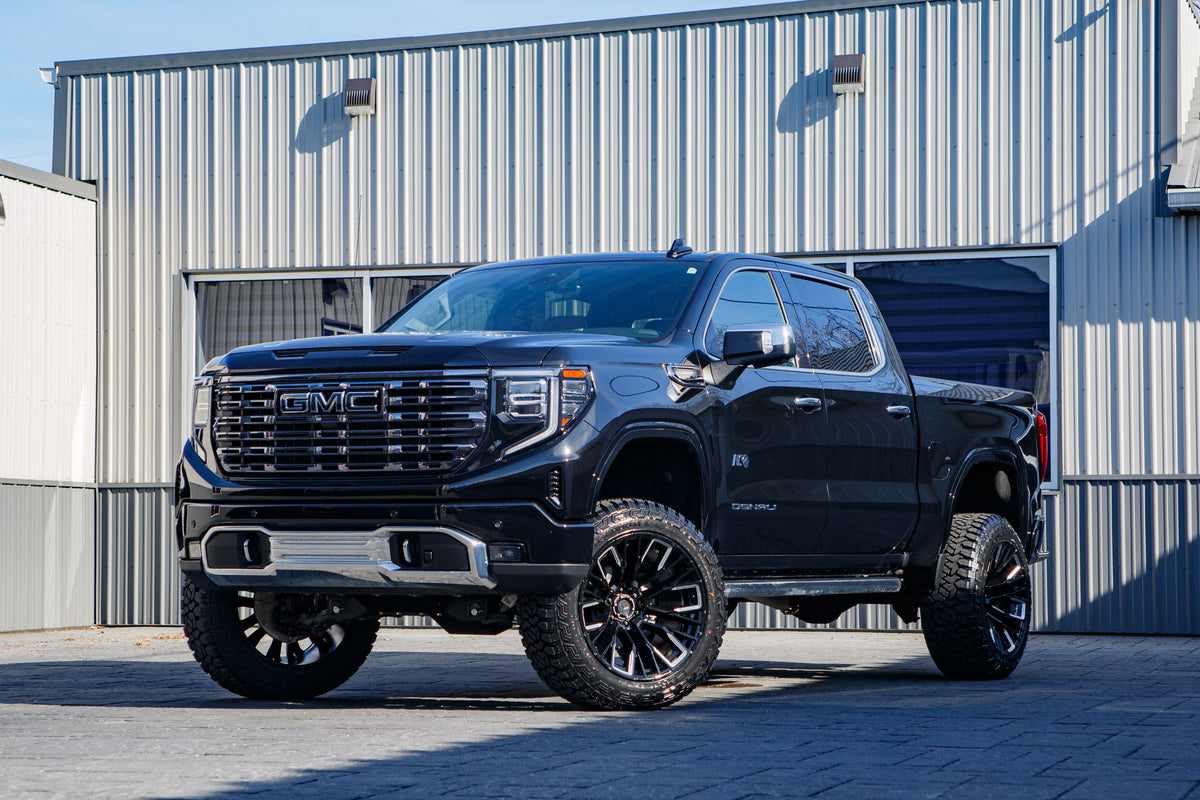 2025 GMC Sierra 1500 Denali Ultimate with a 6" Rough Country lift kit, 22x12 Fuel Rebar wheels, and 35" Fury Country Hunter R/T tires.