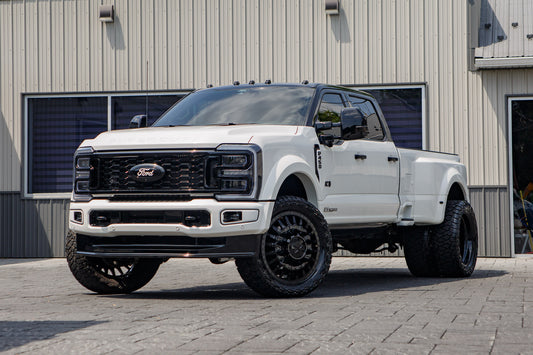 2026 Ford F-450 Super Duty Platinum with a 4" Wicked Lift kit, 24x8.25 American Force Reactor wheels, and 37" Toyo Open Country R/T Trail tires.