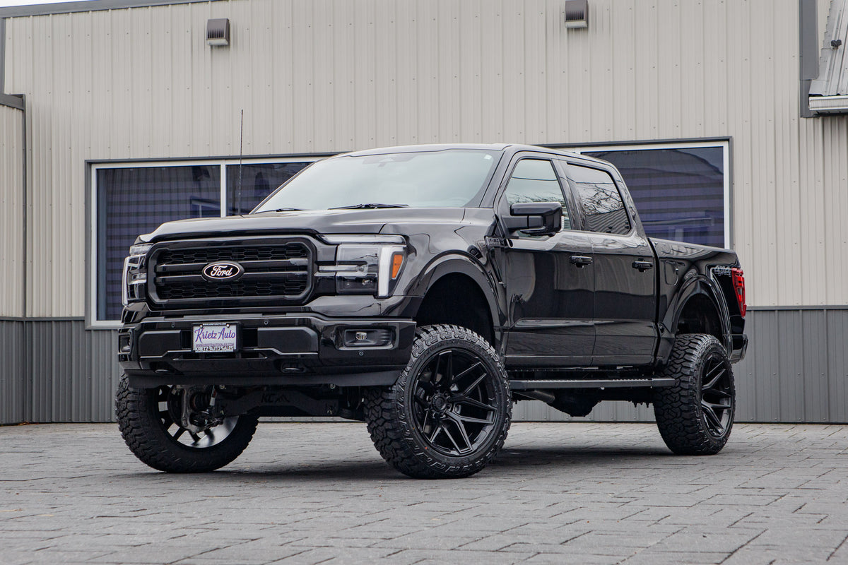 2025 Ford F-150 Lariat with a 6" Rough Country lift kit, 22x12 Fuel Flux wheels, and 35" Fury Country Hunter R/T tires.