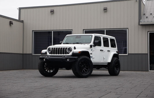 2025 Jeep Wrangler Sahara 4XE with a 2.5" Rough Country lift kit, 20x10 Fuel Circuit wheels, and 35" Avix Trailtek R/T tires.