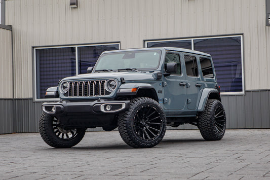 2025 Jeep Wrangler Sahara 4XE with a 2.5" Rough Country lift kit, 22x12 Hostile H123 wheels, and 35" Fury Country Hunter R/T tires.