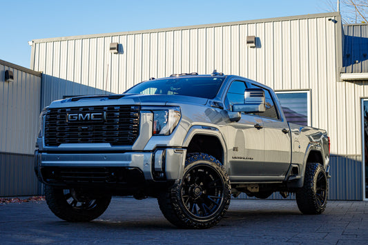 2025 GMC Sierra 3500 Denali with a 3.5" Wicked lift, 22x12 Fuel Catalyst wheels, and 35" Nitto Ridge Grappler tires.