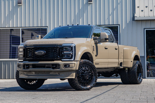 2026 Ford F-450 Super Duty Platinum with a 4" Wicked lift kit, 24x8.25 American Force Plague wheels, and 37" Toyo Open Country R/T Trail tires.