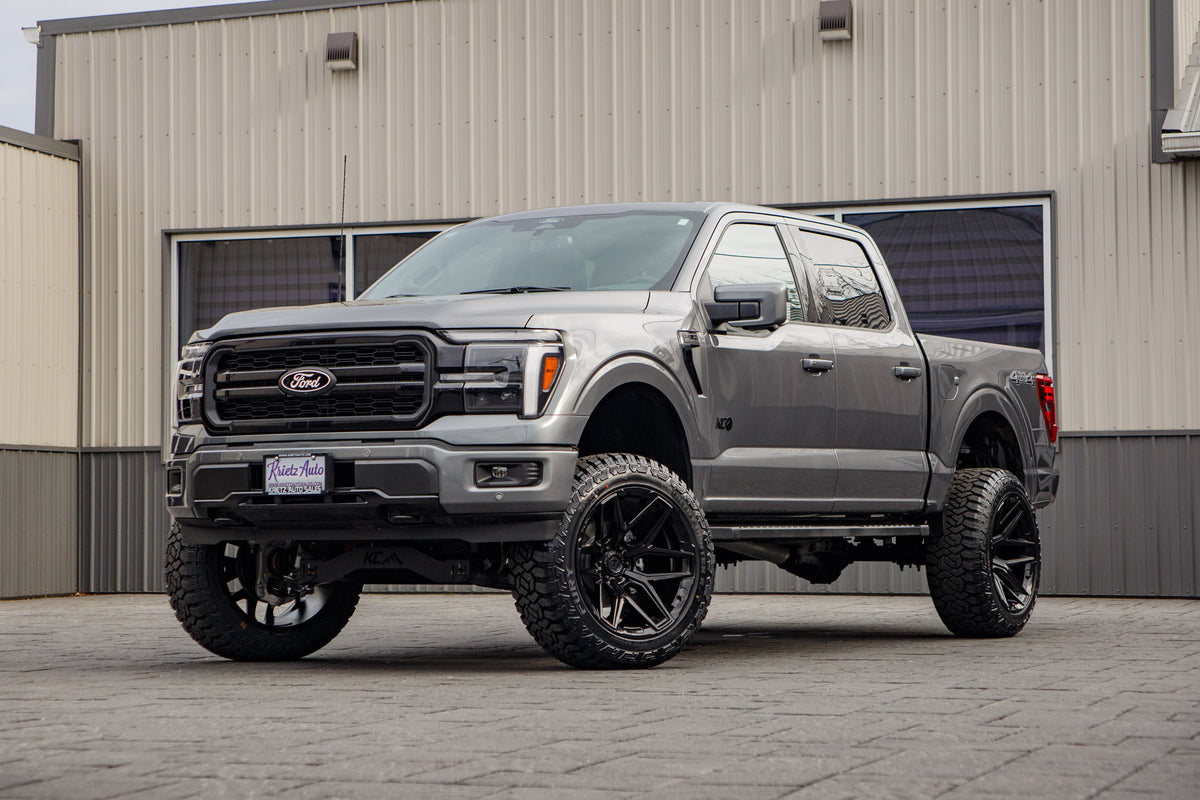 2025 Ford F-150 Lariat with a 6" Rough Country lift kit, 22x12 Fuel Flux wheels, and 35" Fury Country Hunter R/T tires.