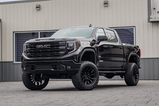 2026 GMC Sierra 1500 Elevation with a 6" Rough Country lift kit, 22x12 Fuel Rebar wheels, and 35" Fury Country Hunter R/T tires.