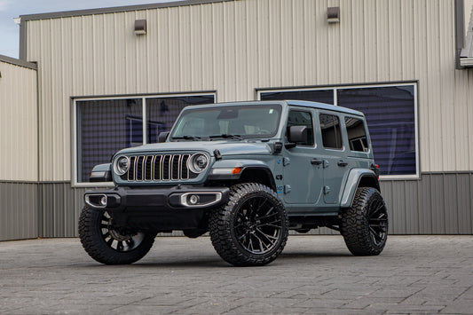 2025 Jeep Wrangler Sahara 4XE with a 2.5" Rough Country lift kit, 22x12 Fuel Rebar wheels, and 35" Fury Country Hunter R/T tires.