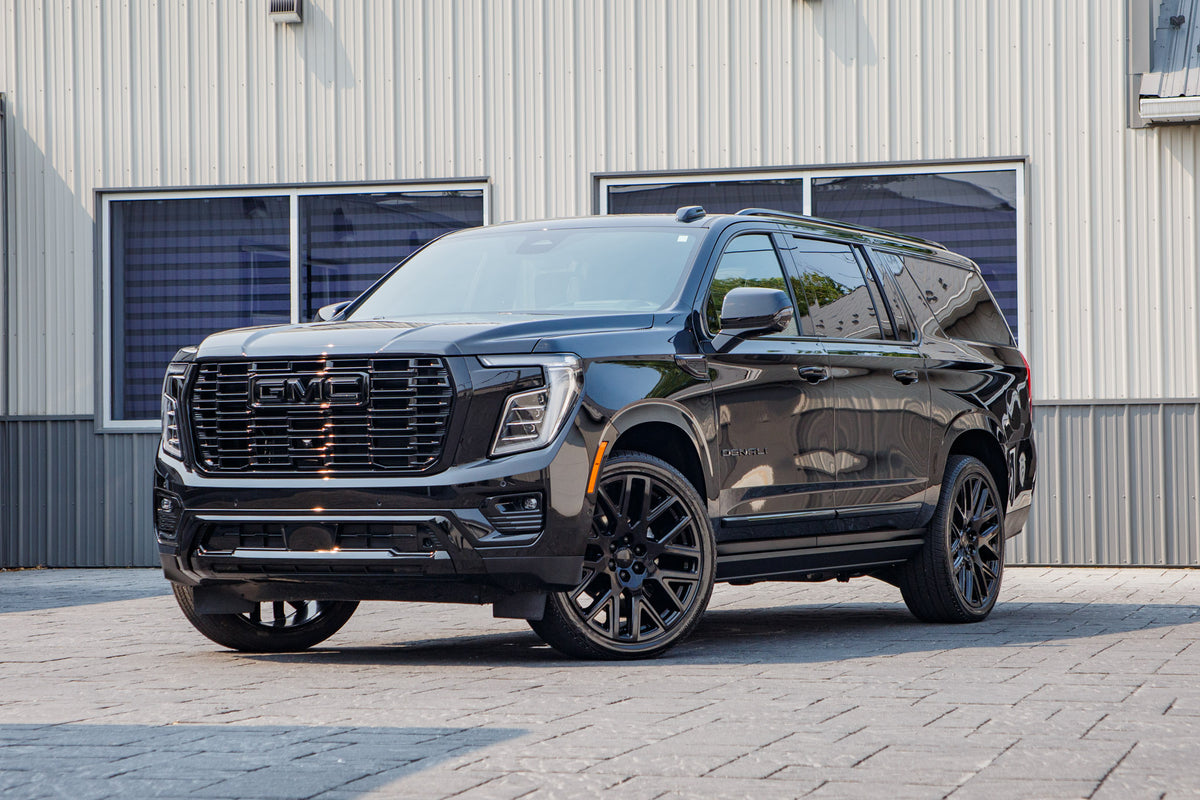 2026 GMC Yukon XL Denali Ultimate with GMC Factory suspension, 22x9 GMC Stock wheels, and 275/50 Bridgestone Alenza tires.