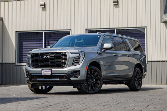 2025 GMC Yukon XL Denali with GMC Factory suspension, GMC Stock wheels and Bridgestone Alenza Tires.