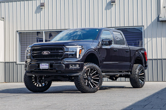 2025 Ford F-150 Lariat with a 6" Rough Country lift kit, 22x12 Hostile H123 wheels, and 35" Fury Country Hunter R/T tires.
