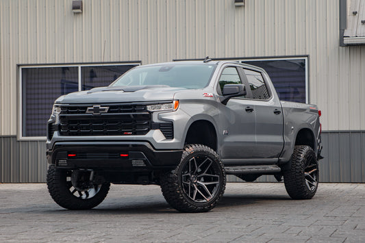 2026 Chevrolet Silverado 1500 LT Trail Boss with a 6" Rough Country lift kit, 22x12 Fuel Flux wheels, and 35" Fury Country Hunter R/T tires.