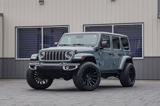 2025 Jeep Wrangler Sahara 4XE with a 2.5" Rough Country lift kit, 22x12 Hostile H123 wheels, and 35" Fury Country Hunter R/T tires.