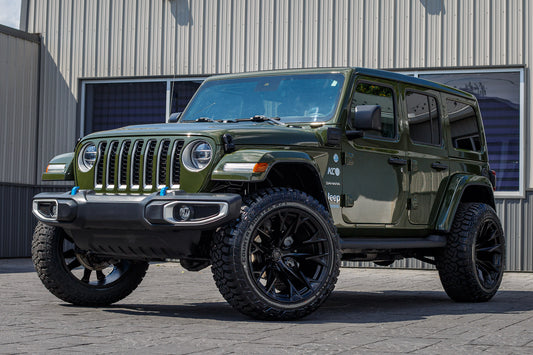 2022 Jeep Wrangler Unlimited Sahara 4XE with a 2.5" Rough Country lift kit, 22x12 Fuel Flame wheels, and 35" Fury Country Hunter R/T tires.