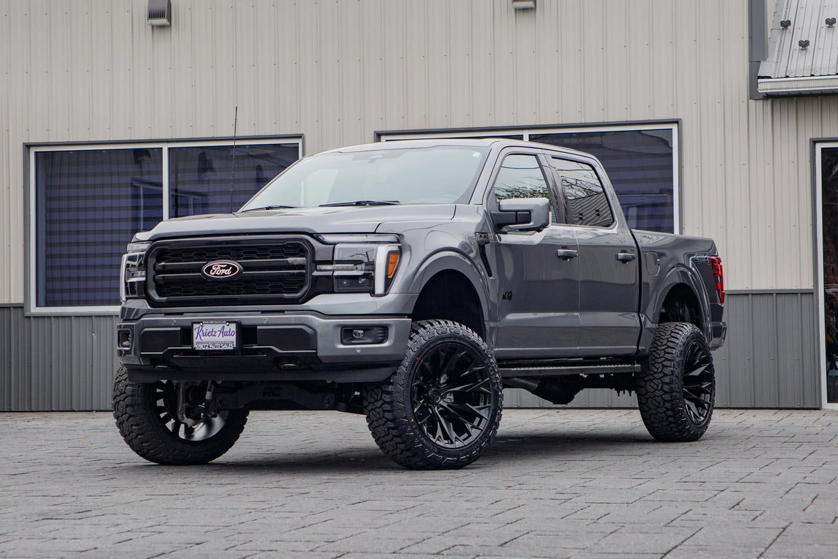 2025 Ford F-150 Lariat with a 6" Rough Country lift kit, 22x12 Fuel Flame wheels, and 35" Fury Country Hunter R/T tires.