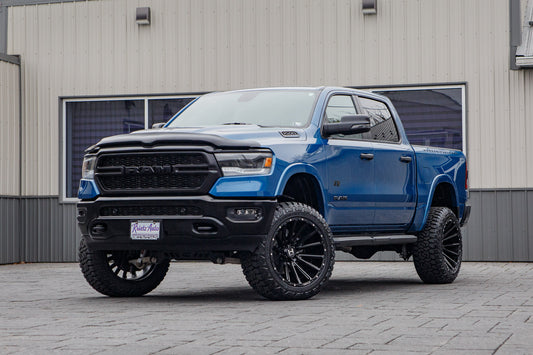 2024 Ram 1500 Lone Star with a 6" Rough Country lift kit, 22x12 Hostile H123 wheels, and 35" Fury Country Hunter R/T tires.