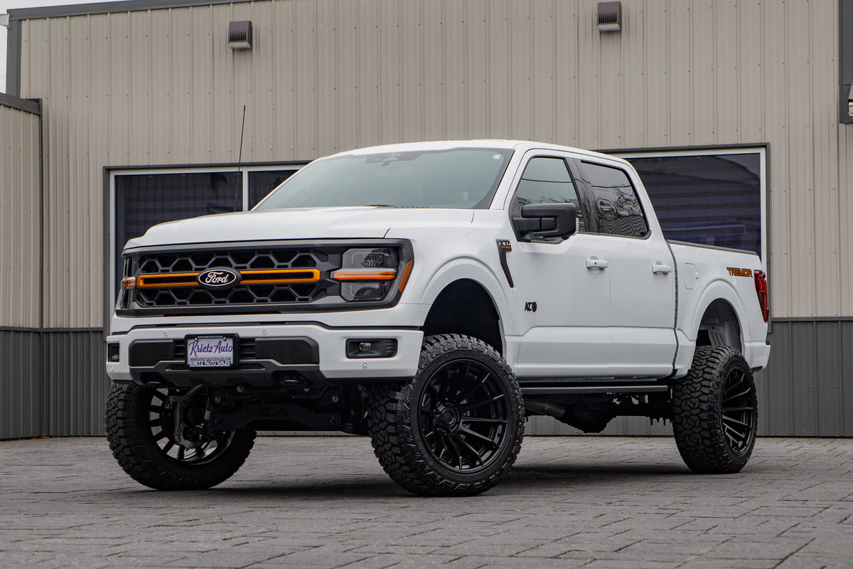2025 Ford F-150 Tremor with a 6" Rough Country lift kit, 22x12 Fuel Burn wheels, and 35" Fury Country Hunter R/T tires.