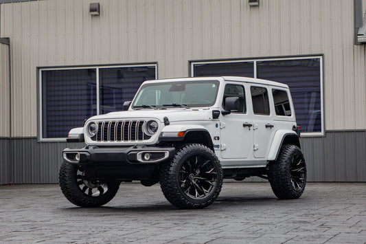 2025 Jeep Wrangler Sahara 4XE with a 2.5" Rough Country lift kit, 22x12 Fuel Flame wheels, and 35" Fury Country Hunter R/T tires.