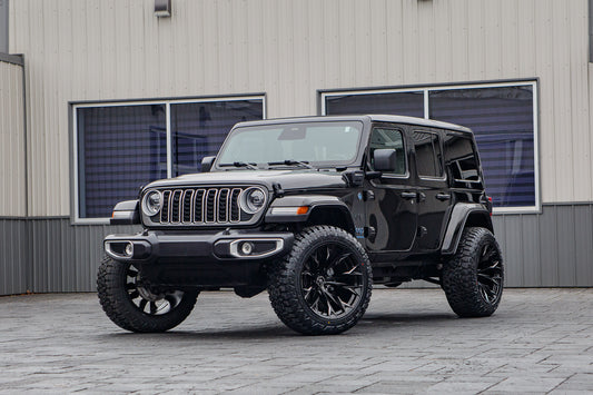 2025 Jeep Wrangler Sahara 4XE with a 2.5" Rough Country lift kit, 20x10 Fuel Blade wheels, and 35" Avix Trailtek R/T tires.