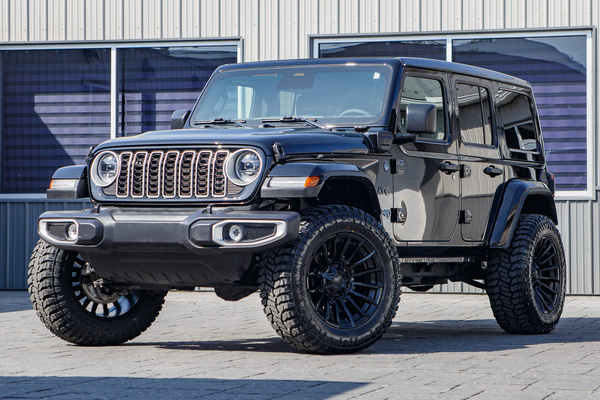 2025 Jeep Wrangler Sahara 4XE with a 2.5" Rough Country lift kit, 22x12 Fuel Flame wheels, and 35" Fury Country Hunter R/T tires.