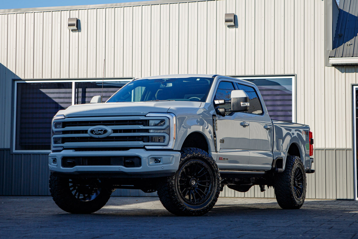 2026 Ford F-250 Super Duty Platinum with a 6" ReadyLift lift kit, 22x12 Fuel Clash wheels, and 37" Nitto Ridge Grappler tires.