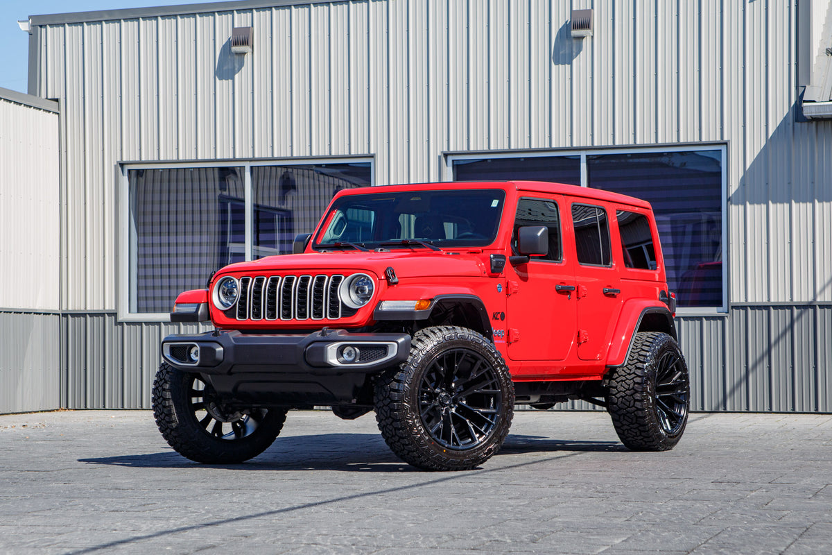 2025 Jeep Wrangler Sahara 4XE with a 2.5" Rough Country lift kit, 22x12 Fuel Rebar wheels, and 35" Fury Country Hunter R/T tires.
