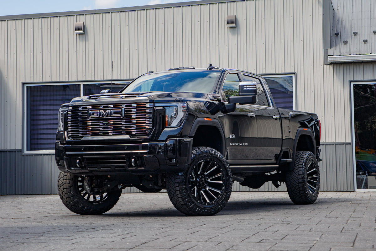 2025 GMC Sierra 2500 Denali Ultimate with a 5" BDS lift kit, 22x12 Hostile H123 wheels, and 37" Nitto Ridge Grappler tires.