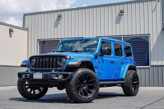 2024 Jeep Wrangler Rubicon 4XE with Jeep Stock suspension, 22x12 Fuel Flame wheels, and 35" Country Hunter R/T tires.
