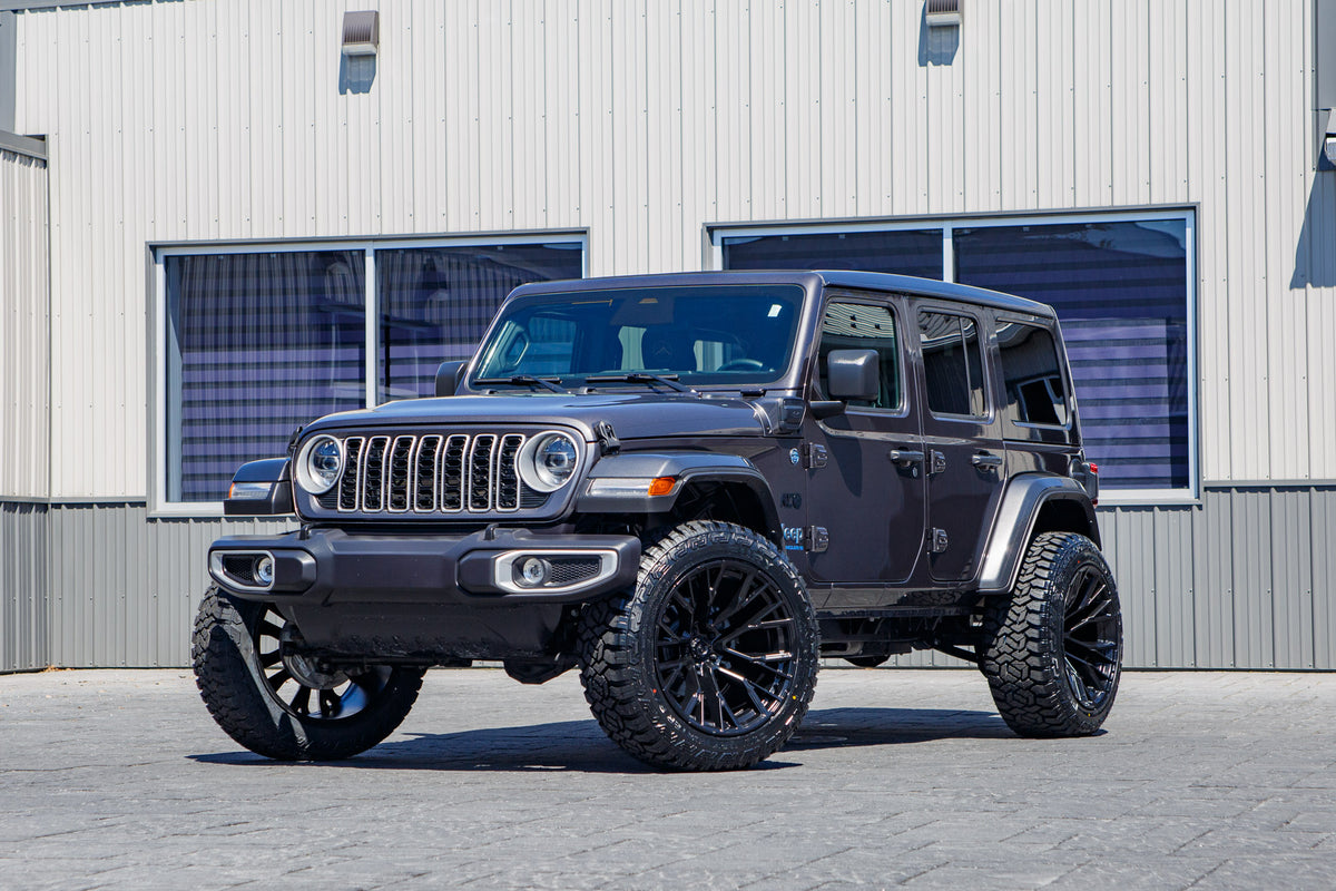 2025 Jeep Wrangler Sahara 4XE with a 2.5" Rough Country lift kit, 22x12 Fuel Rebar wheels, and 35" Fury Country Hunter R/T tires.