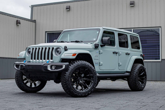 2023 Jeep Wrangler Sahara 4XE with a 2.5" Rough Country lift kit, 22x12 Fuel Flame wheels, and 35" Fury Country Hunter R/T tires.