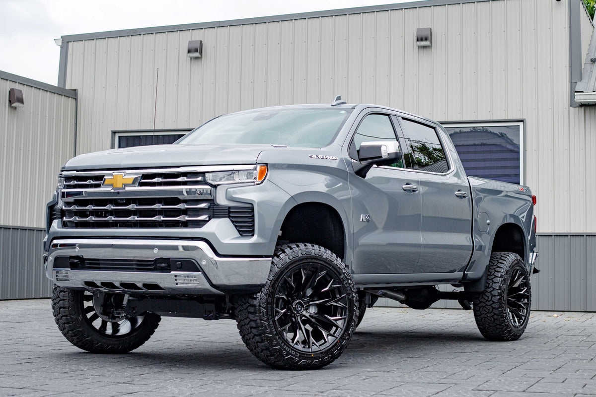 2025 Chevrolet Silverado 1500 LTZ with a 6" Rough Country lift kit, 22x12 Fuel Flame wheels, and 35" Fury Country Hunter R/T tires.