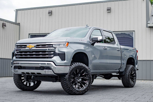 2025 Chevrolet Silverado 1500 LTZ with a 6" Rough Country lift kit, 22x12 Fuel Flame wheels, and 35" Fury Country Hunter R/T tires.