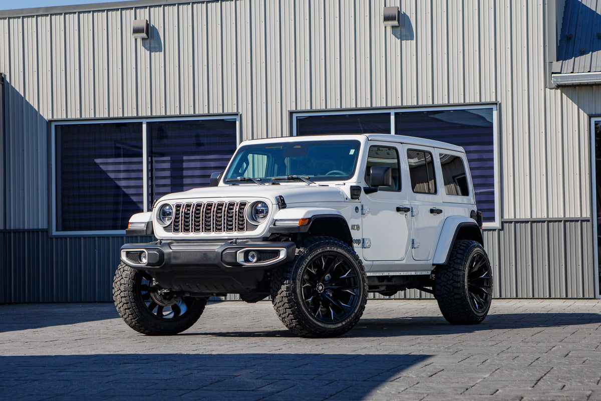 2025 Jeep Wrangler Sahara 4XE with a 2.5" Rough Country lift kit, 22x12 Fuel Flame wheels, and 35" Fury Country Hunter R/T tires.