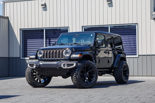 2025 Jeep Wrangler Sahara 4XE with a 2.5" Rough Country lift kit, 22x12 Fuel Flame wheels, and 35" Fury Country Hunter R/T tires.