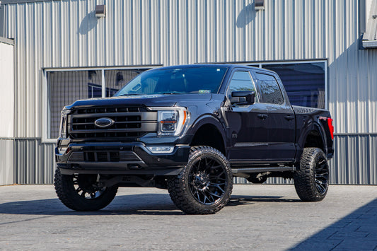 2022 Ford F-150 Lariat with a 6" Rough Country lift kit, 22x12 Fuel Twitch wheels, and 35" Fury Country Hunter R/T tires.
