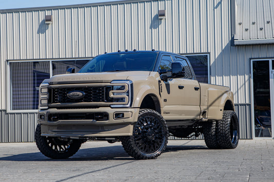 2026 Ford F-450 Super Duty Platinum with a 4" Wicked lift kit, 26x8.25 American Force Evo wheels, and 37" AMP Terrain Attack M/T A tires.